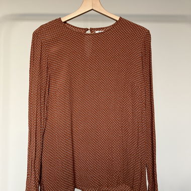 Blusa a maniche lunghe