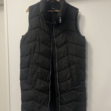 Black long quilted vest
