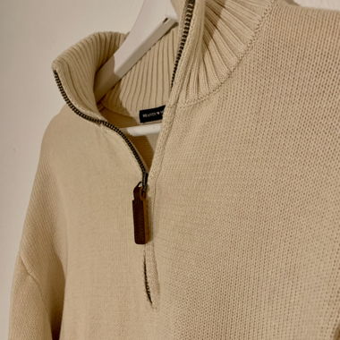 Beige knit sweater from Brandy Melville