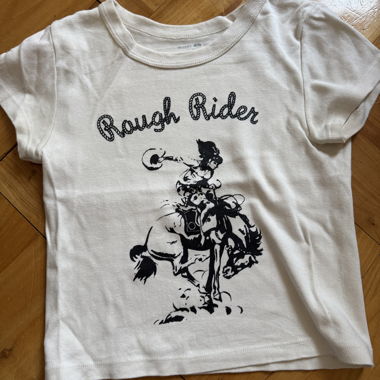 Top di Brandy con un cowboy sopra