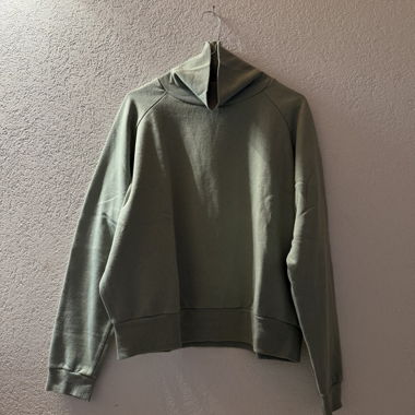 Green turtleneck sweater