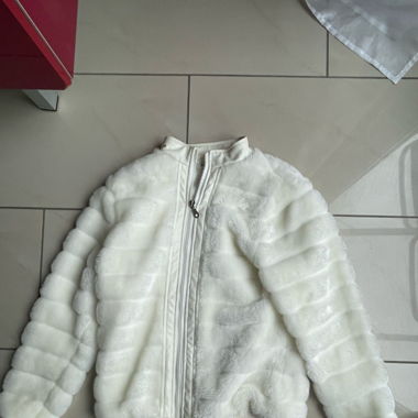 white fur jacket