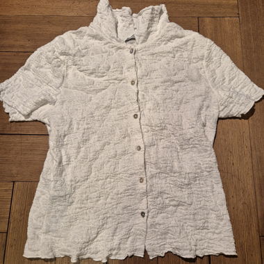 Blusa bianca a maniche corte