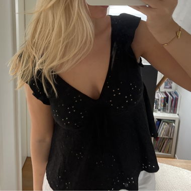 Black top with little holes