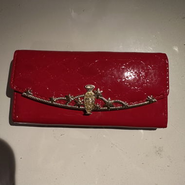 Portafoglio rosso con interno rosa