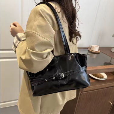 Black patent handbag
