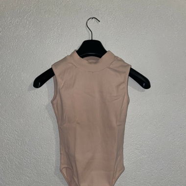 tight body in light pink