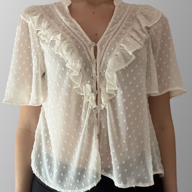 Blusa Zara color crema con volant