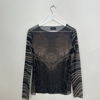 Top long sleeve trasparente con fantasia floreale