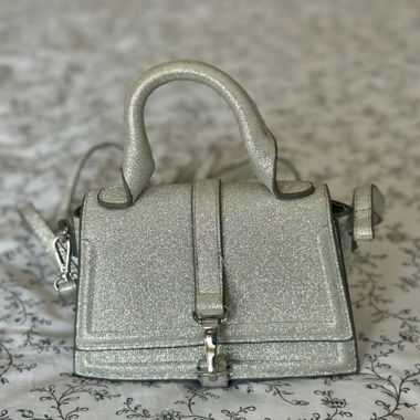 Silberne Pailletten-Tasche