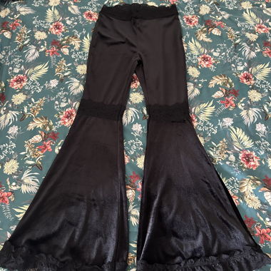 Black velvet flared trousers
