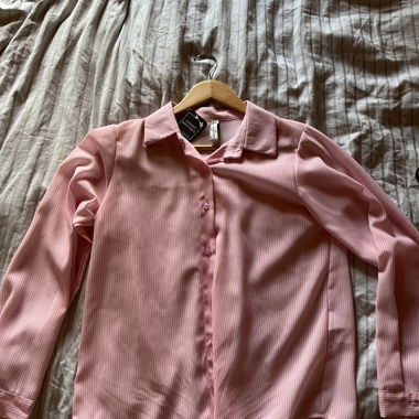 Camicia a righe rosa e bianca