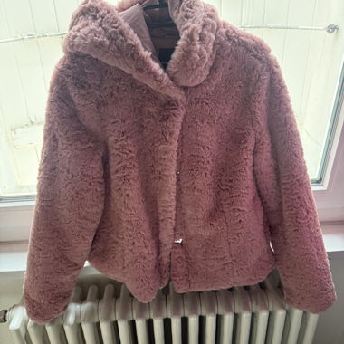 Veste en fausse fourrure rose