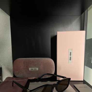 MiuMiu Sonnenbrille schwarz/braun