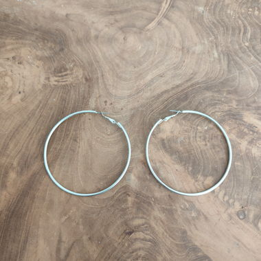 Silver-colored hoop earrings