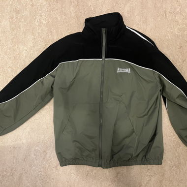 Grüne Übergangsjacke