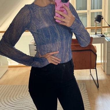 See through blue mesh top