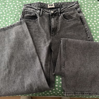 Jeans grigio sbiadito con strass