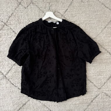 Black short-sleeve blouse