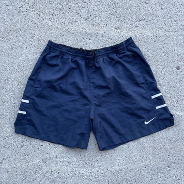 Shorts Nike bleu, taille M, coupe baggy