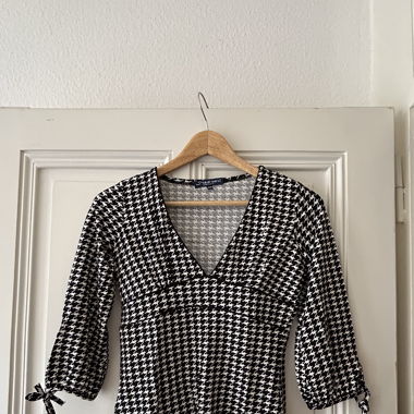 Checkered white and black blouse