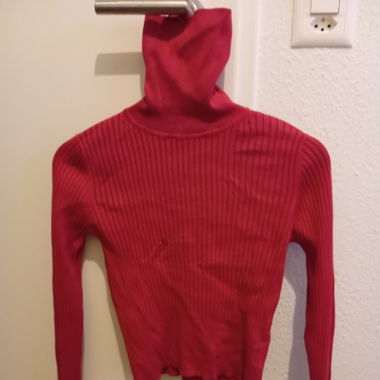 Pull col roulé rose