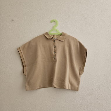 Polo beige senza maniche