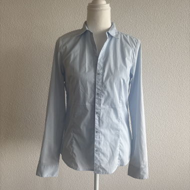 Blusa azzurro chiaro a maniche lunghe