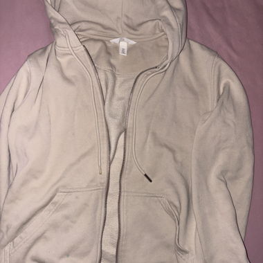 Veste à capuche beige avec fermeture éclair