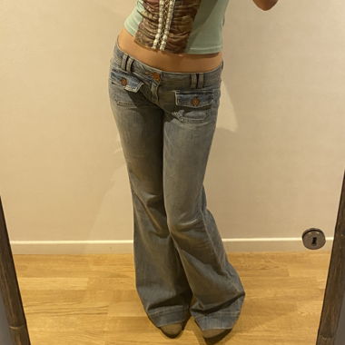 Jeans en denim taille basse évasée