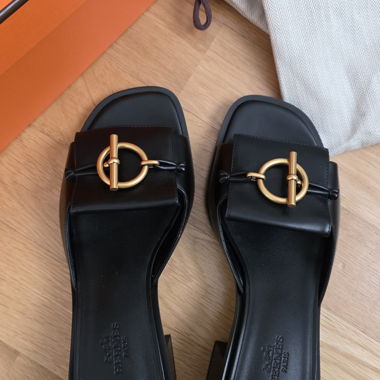 Zoccoli con tacco neri Hermès