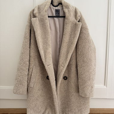 Manteau molletonné beige