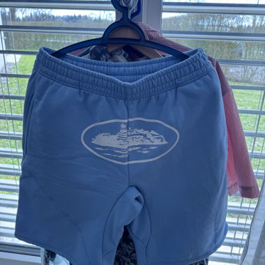 Pantaloncini in felpa azzurri chiaro con stampa, taglia M