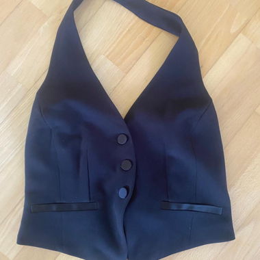 Black vest with back band