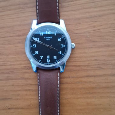 Tissot watch in brown leather