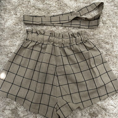 Shorts à carreaux avec ceinture
