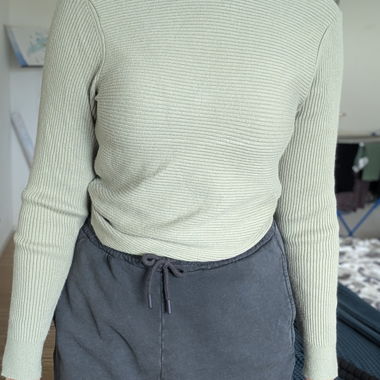 Sage green ribbed cross-back cropped sweater