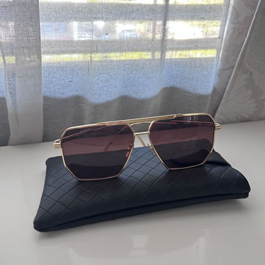 Goldene Sonnenbrille