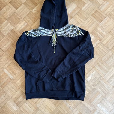 Black hoodie with wing print