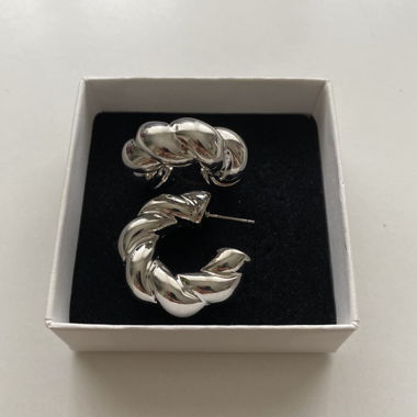 big silver hoops twirled