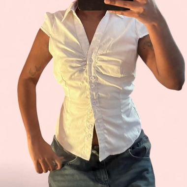 White button-up blouse with flattering fit