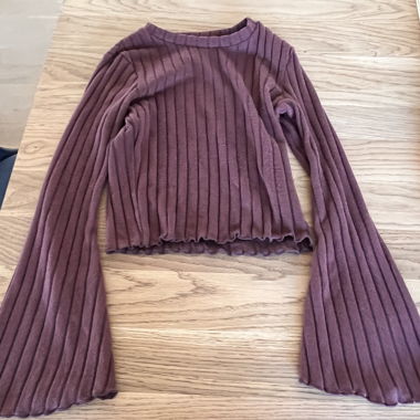 Ribbed crop sweater with trumpet sleeves