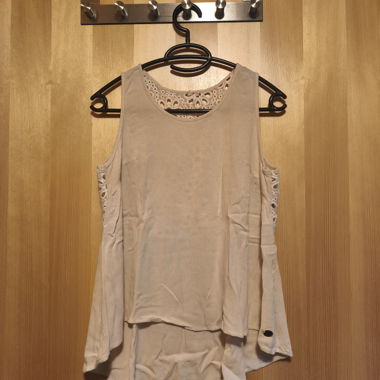 Top smanicato in pizzo Rip Curl beige