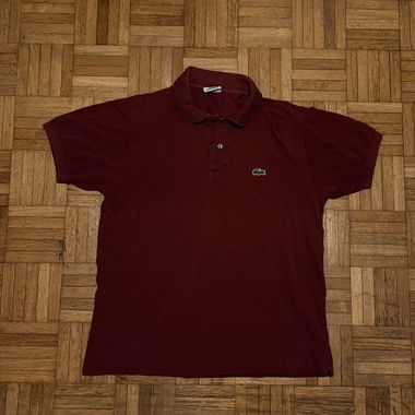 Polo unisex classica Lacoste, taglia L. Colore bordeaux, perfetta per l'autunno.