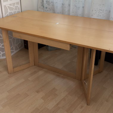 Foldable table with drawer