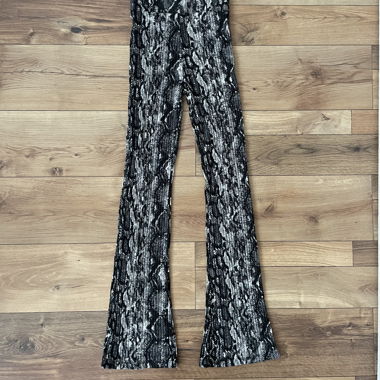 Pantalon évasé à motif serpent