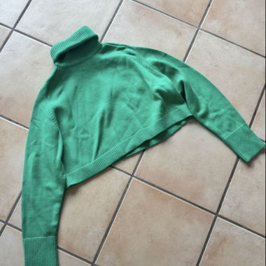 green turtleneck sweater