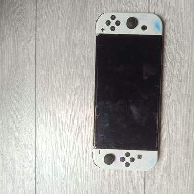 Nintendo switch OLED  with the charger the box etc