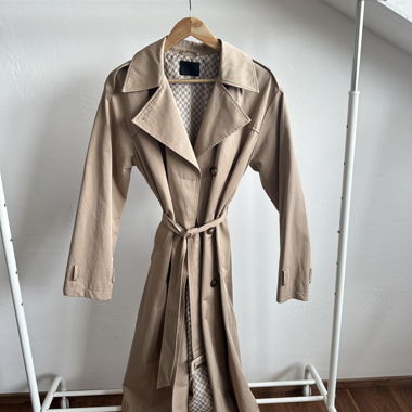 Beige trench coat with tie belt