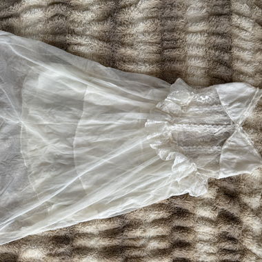 Abito in pizzo bianco